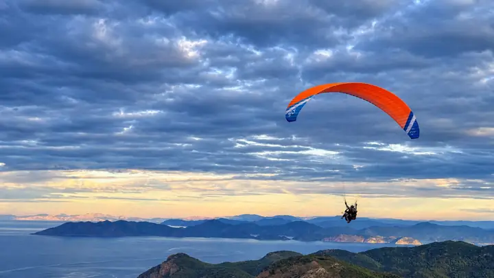 weFLY tandem paraglider in flight