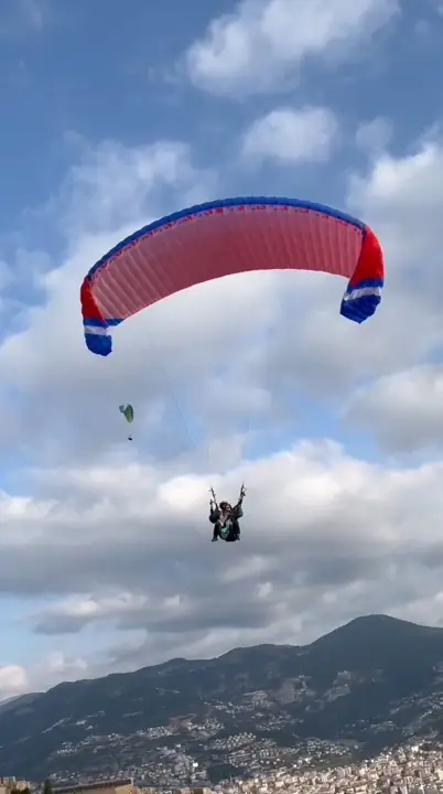 weFLY tandem paraglider in flight