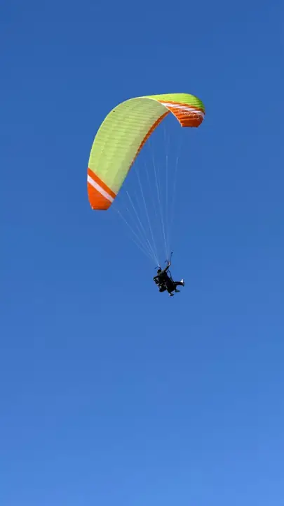 weFLY tandem paraglider in flight